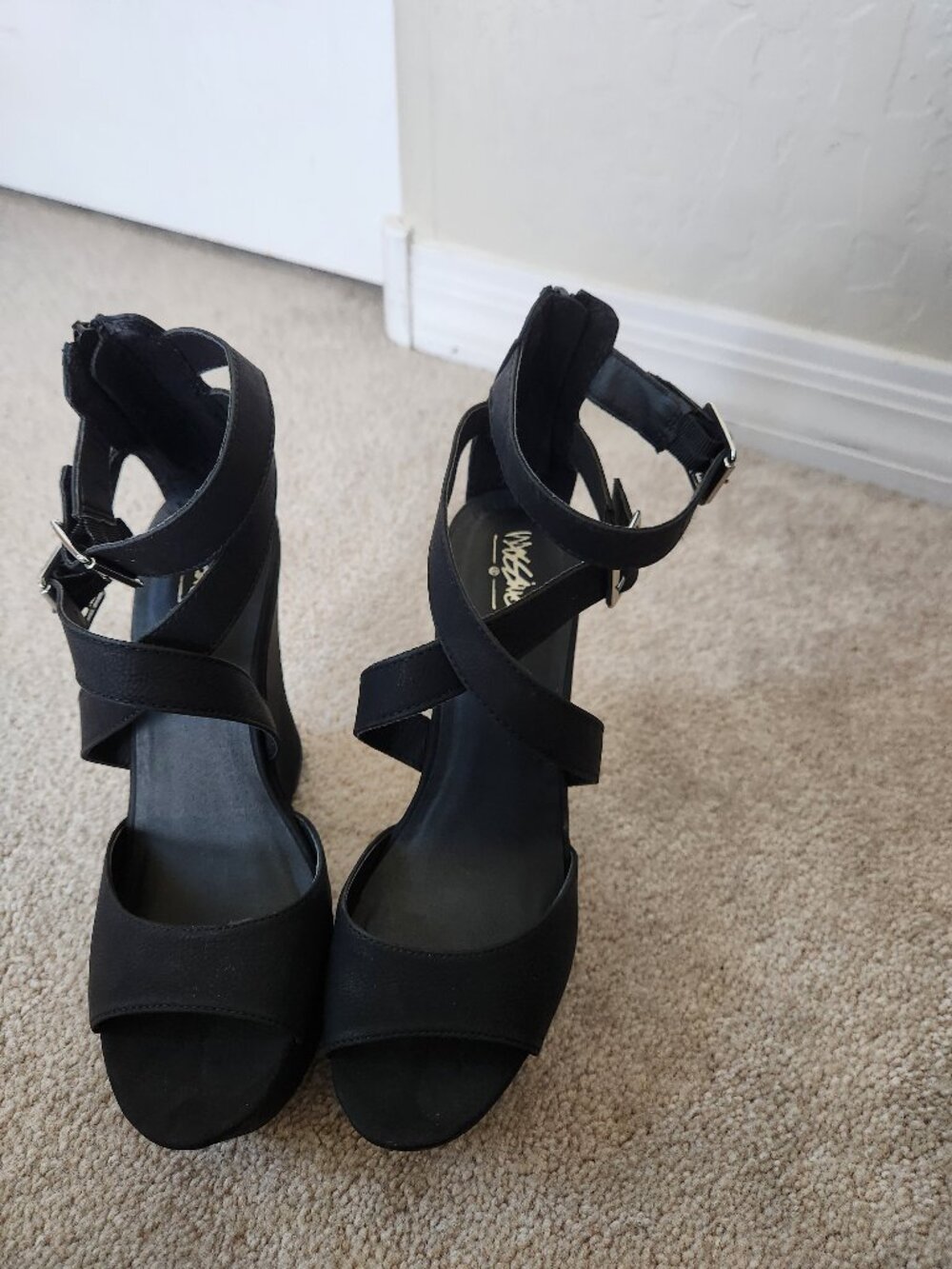Black strappy, wedges.